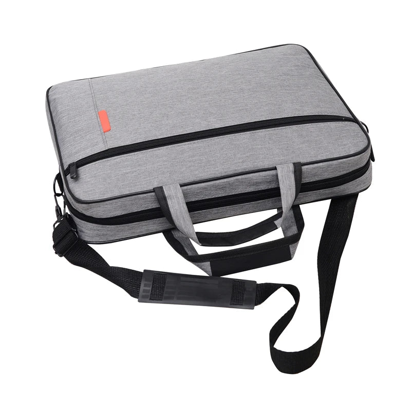 Grey laptop carry bag from above with the padded shoulder strap attached