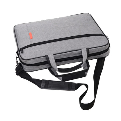 Grey laptop carry bag from above with the padded shoulder strap attached